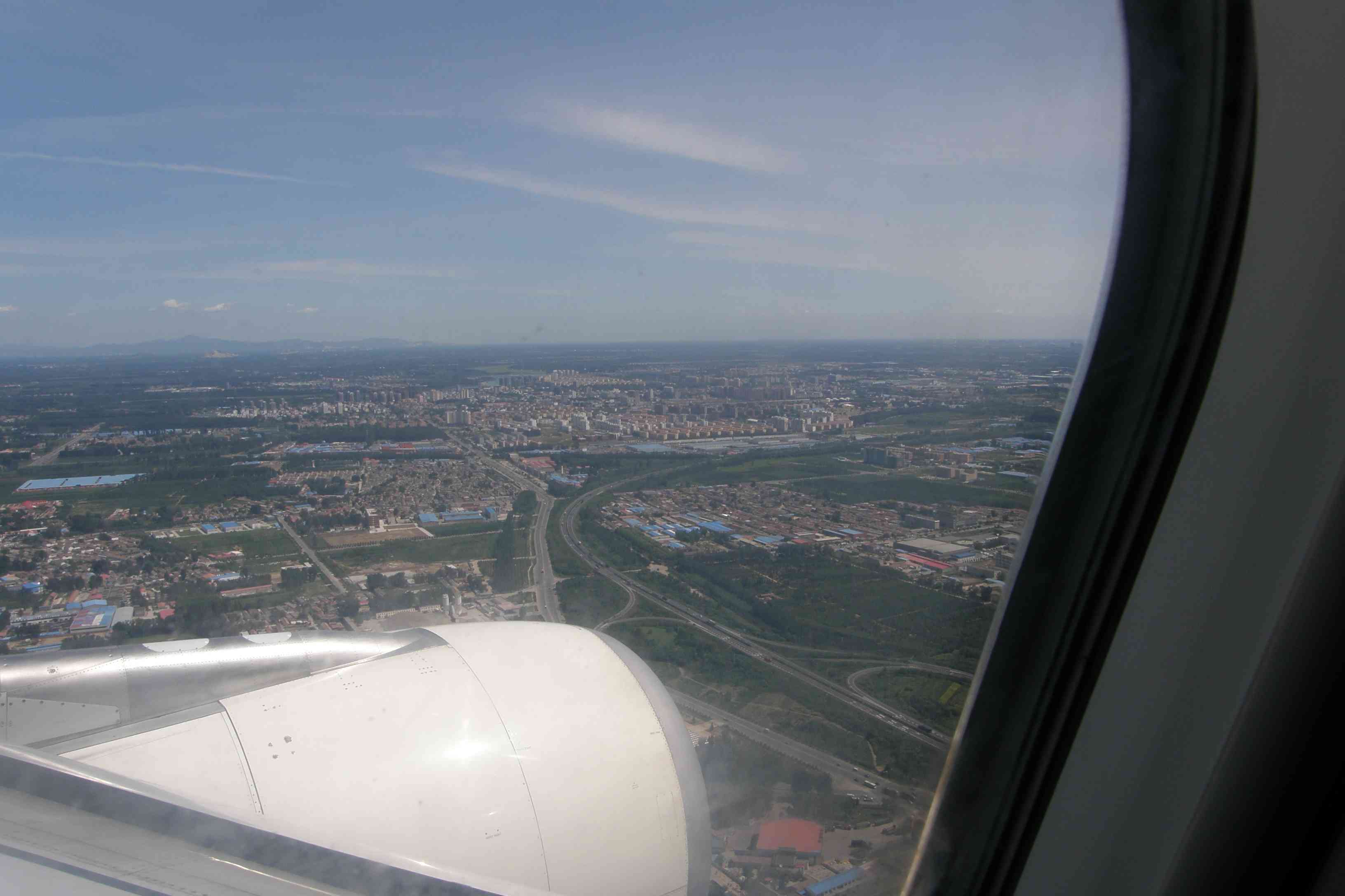 Letecký pohled na Peking před přistáním I.